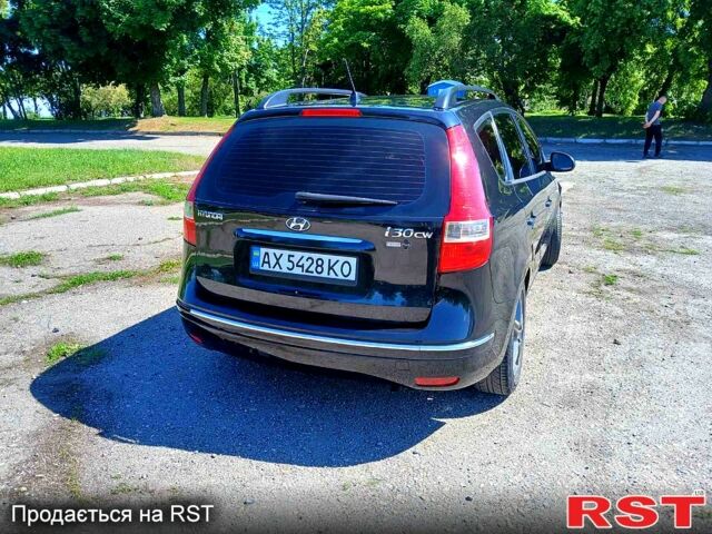 Черный Хендай i30, объемом двигателя 1.4 л и пробегом 208 тыс. км за 5799 $, фото 1 на Automoto.ua