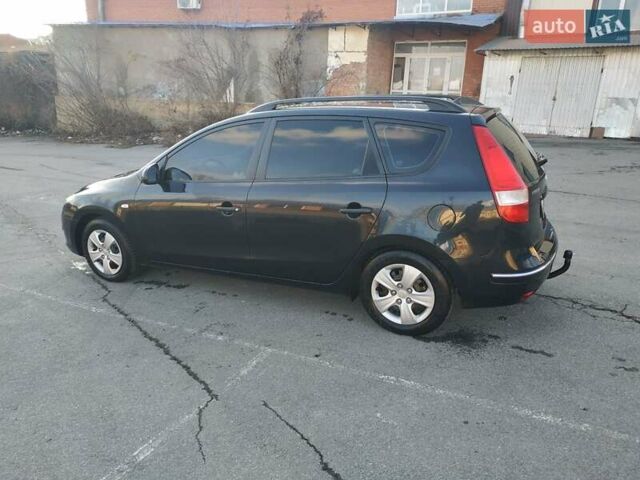 Черный Хендай i30, объемом двигателя 1.4 л и пробегом 158 тыс. км за 5600 $, фото 9 на Automoto.ua