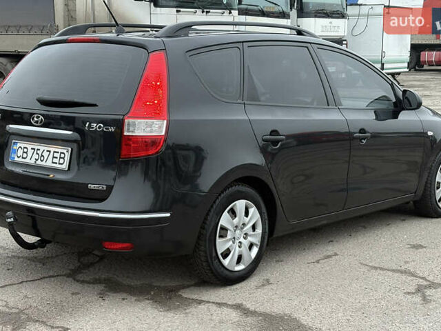 Черный Хендай i30, объемом двигателя 1.6 л и пробегом 265 тыс. км за 5900 $, фото 5 на Automoto.ua