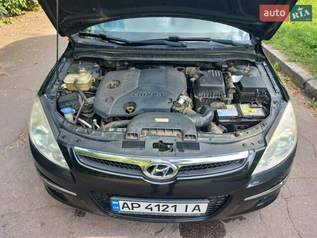 Черный Хендай i30, объемом двигателя 1.58 л и пробегом 203 тыс. км за 5700 $, фото 12 на Automoto.ua