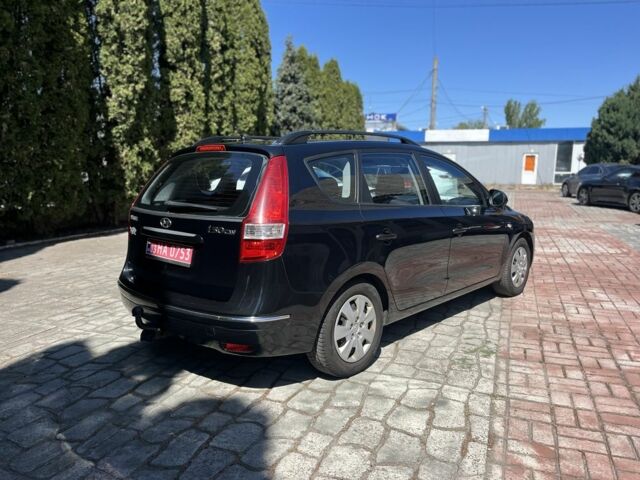 Черный Хендай i30, объемом двигателя 1.6 л и пробегом 230 тыс. км за 6800 $, фото 2 на Automoto.ua
