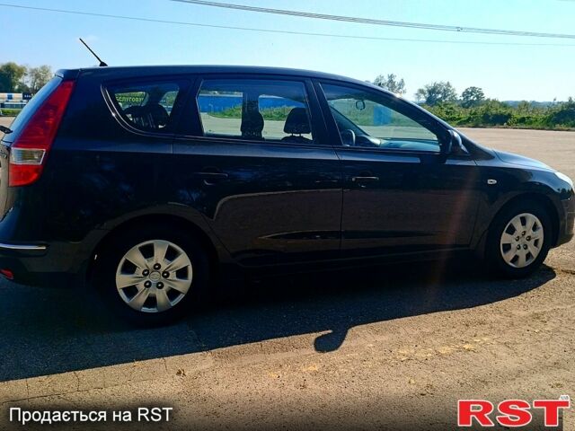 Чорний Хендай i30, об'ємом двигуна 1.6 л та пробігом 190 тис. км за 6999 $, фото 2 на Automoto.ua