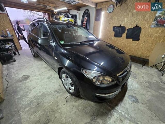 Чорний Хендай i30, об'ємом двигуна 1.6 л та пробігом 231 тис. км за 5600 $, фото 1 на Automoto.ua