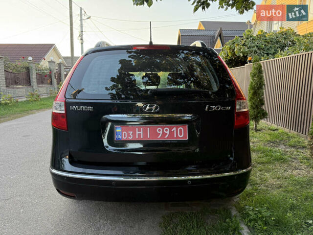 Черный Хендай i30, объемом двигателя 1.6 л и пробегом 229 тыс. км за 6700 $, фото 4 на Automoto.ua