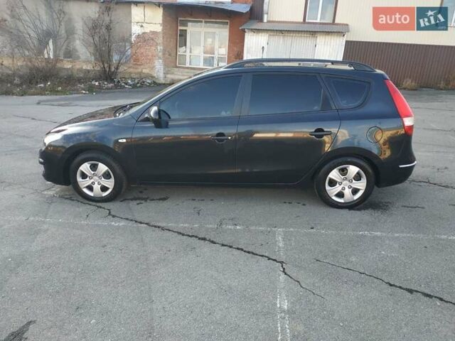 Черный Хендай i30, объемом двигателя 1.4 л и пробегом 158 тыс. км за 5600 $, фото 10 на Automoto.ua