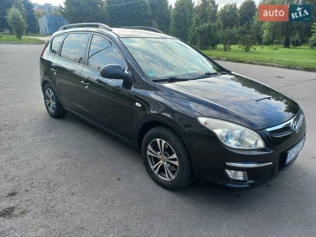 Черный Хендай i30, объемом двигателя 1.58 л и пробегом 203 тыс. км за 5700 $, фото 7 на Automoto.ua