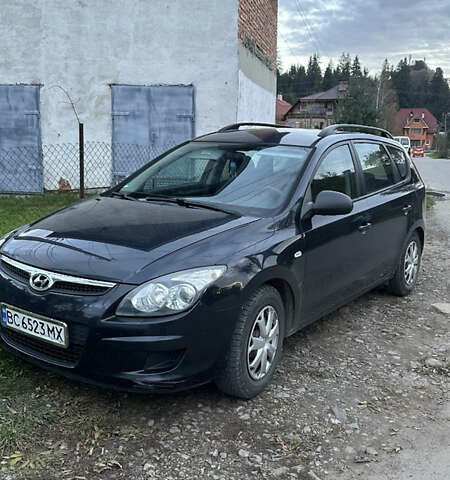Черный Хендай i30, объемом двигателя 1.58 л и пробегом 243 тыс. км за 5500 $, фото 1 на Automoto.ua