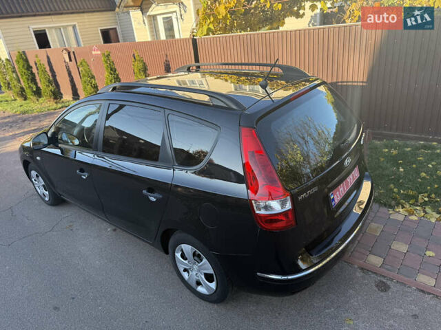 Хендай i30 2009 в Борисполе на Automoto.ua Черный Хендай i30, объемом двигателя 1.6 л и пробегом 229 тыс. км за 7000 $, фото 14 на Automoto.ua