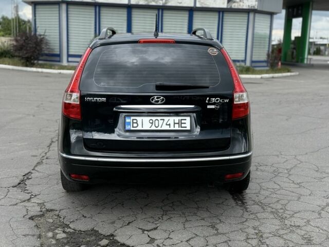 Черный Хендай i30, объемом двигателя 1.4 л и пробегом 172 тыс. км за 5950 $, фото 5 на Automoto.ua