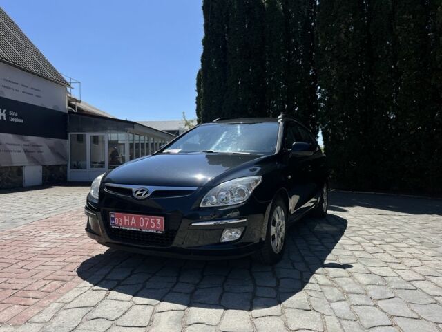 Черный Хендай i30, объемом двигателя 1.6 л и пробегом 230 тыс. км за 6800 $, фото 6 на Automoto.ua