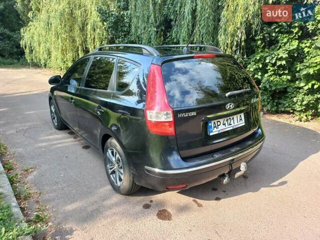 Черный Хендай i30, объемом двигателя 1.58 л и пробегом 203 тыс. км за 5700 $, фото 6 на Automoto.ua
