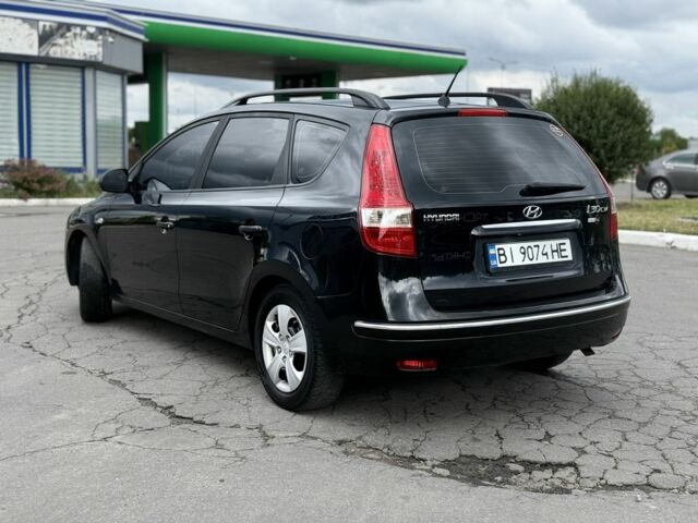 Черный Хендай i30, объемом двигателя 1.4 л и пробегом 172 тыс. км за 5950 $, фото 6 на Automoto.ua