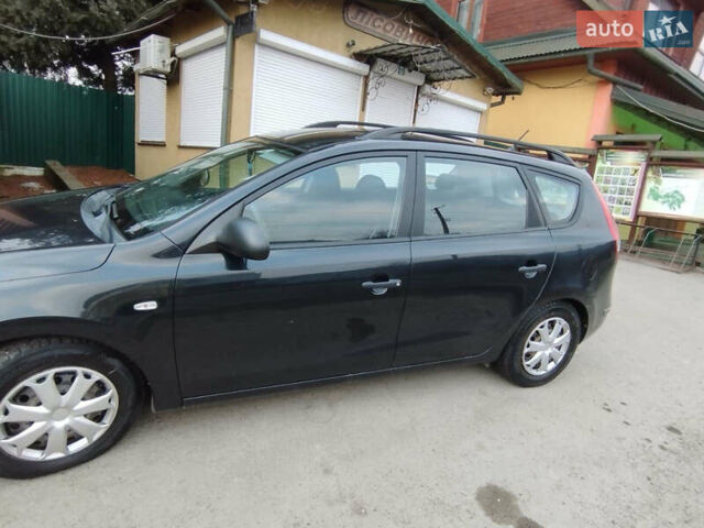 Черный Хендай i30, объемом двигателя 1.58 л и пробегом 234 тыс. км за 5100 $, фото 4 на Automoto.ua
