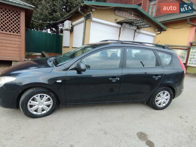 Черный Хендай i30, объемом двигателя 1.58 л и пробегом 234 тыс. км за 5100 $, фото 1 на Automoto.ua