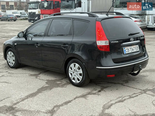 Черный Хендай i30, объемом двигателя 1.6 л и пробегом 265 тыс. км за 5900 $, фото 2 на Automoto.ua