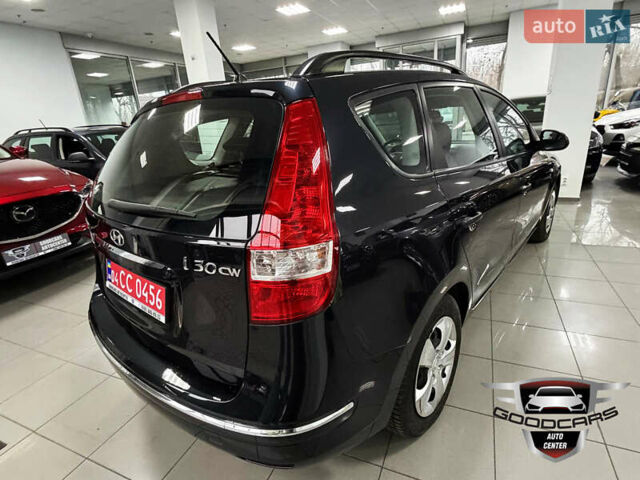 Черный Хендай i30, объемом двигателя 1.4 л и пробегом 190 тыс. км за 6900 $, фото 1 на Automoto.ua