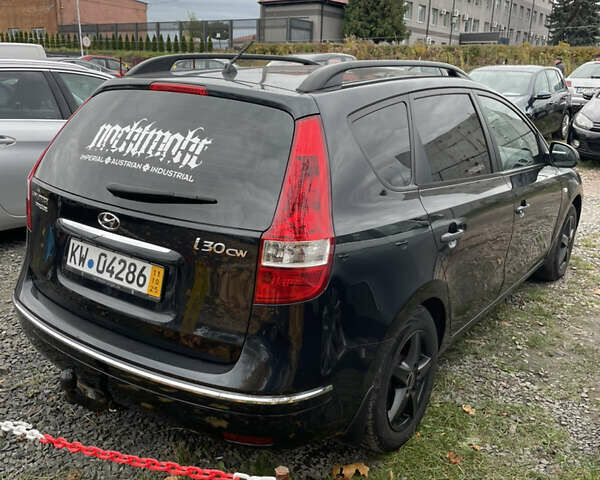 Черный Хендай i30, объемом двигателя 1.4 л и пробегом 228 тыс. км за 5800 $, фото 3 на Automoto.ua