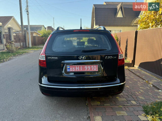 Хендай i30 2009 в Борисполе на Automoto.ua Черный Хендай i30, объемом двигателя 1.6 л и пробегом 229 тыс. км за 7000 $, фото 4 на Automoto.ua