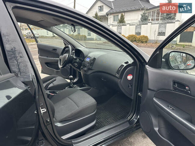 Черный Хендай i30, объемом двигателя 1.4 л и пробегом 199 тыс. км за 5599 $, фото 44 на Automoto.ua