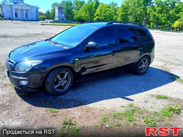 Черный Хендай i30, объемом двигателя 1.4 л и пробегом 208 тыс. км за 5799 $, фото 2 на Automoto.ua