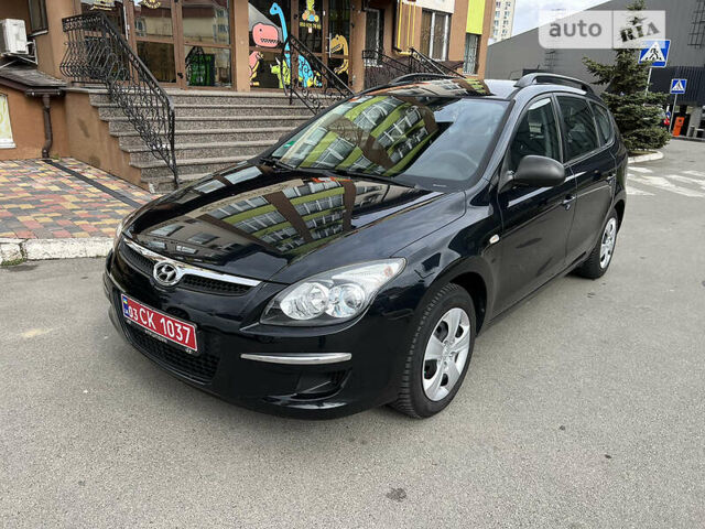 Черный Хендай i30, объемом двигателя 1.4 л и пробегом 158 тыс. км за 6800 $, фото 2 на Automoto.ua