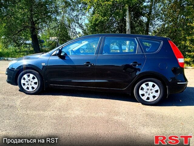 Чорний Хендай i30, об'ємом двигуна 1.6 л та пробігом 190 тис. км за 6999 $, фото 1 на Automoto.ua