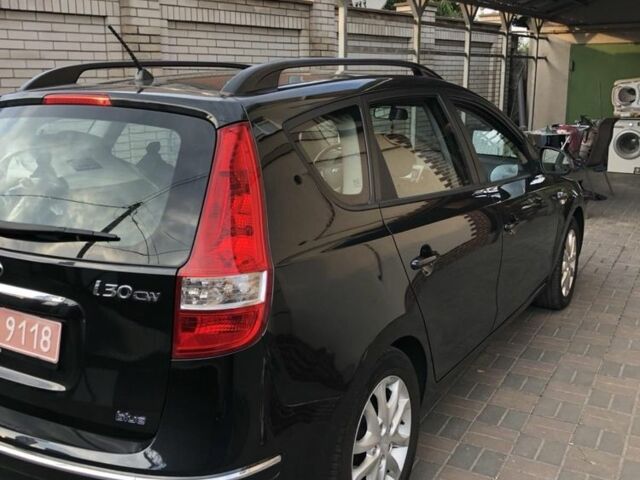 Чорний Хендай i30, об'ємом двигуна 1.4 л та пробігом 217 тис. км за 5500 $, фото 1 на Automoto.ua