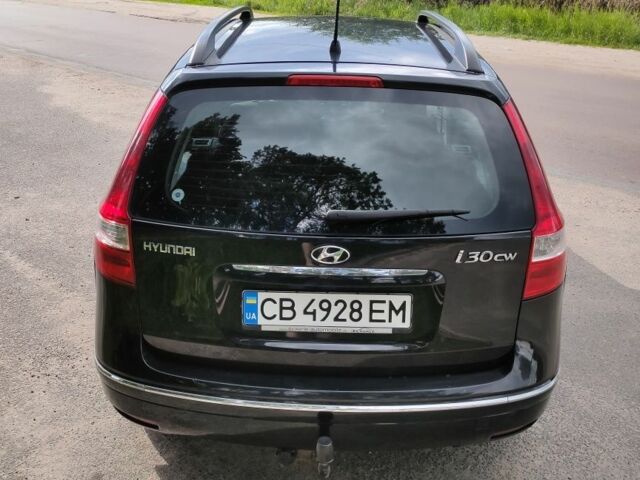 Черный Хендай i30, объемом двигателя 1.4 л и пробегом 220 тыс. км за 6100 $, фото 3 на Automoto.ua