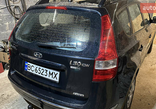 Черный Хендай i30, объемом двигателя 1.58 л и пробегом 243 тыс. км за 5500 $, фото 6 на Automoto.ua