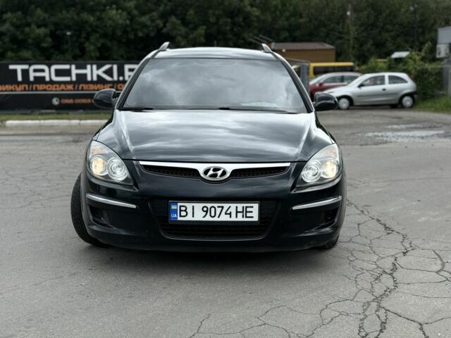 Черный Хендай i30, объемом двигателя 1.4 л и пробегом 172 тыс. км за 5950 $, фото 1 на Automoto.ua