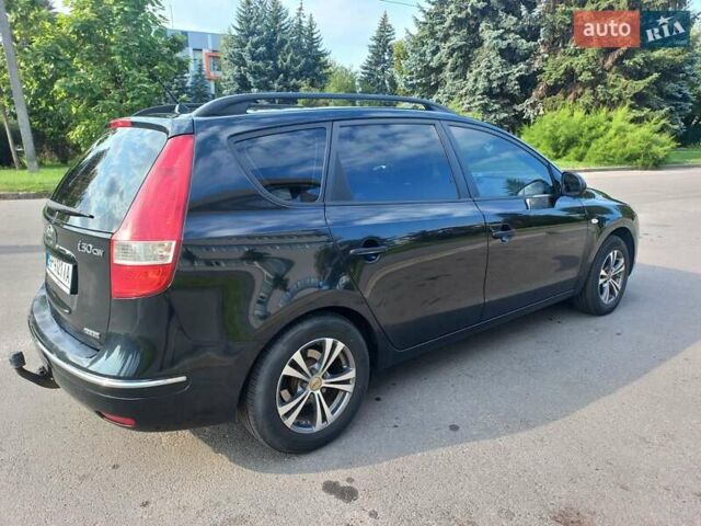 Черный Хендай i30, объемом двигателя 1.58 л и пробегом 203 тыс. км за 5700 $, фото 2 на Automoto.ua