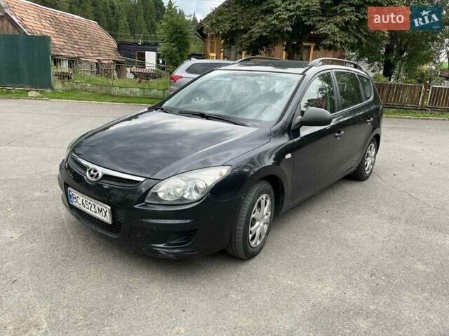 Черный Хендай i30, объемом двигателя 1.58 л и пробегом 242 тыс. км за 4950 $, фото 6 на Automoto.ua
