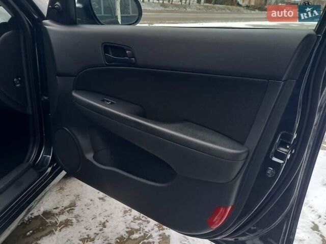 Чорний Хендай i30, об'ємом двигуна 1.4 л та пробігом 216 тис. км за 6400 $, фото 17 на Automoto.ua