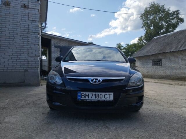 Черный Хендай i30, объемом двигателя 1.4 л и пробегом 163 тыс. км за 5800 $, фото 1 на Automoto.ua