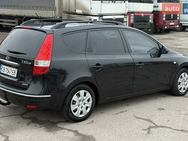 Черный Хендай i30, объемом двигателя 1.6 л и пробегом 265 тыс. км за 5900 $, фото 6 на Automoto.ua