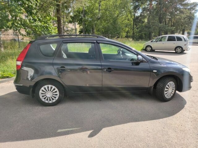 Черный Хендай i30, объемом двигателя 1.4 л и пробегом 220 тыс. км за 6100 $, фото 5 на Automoto.ua