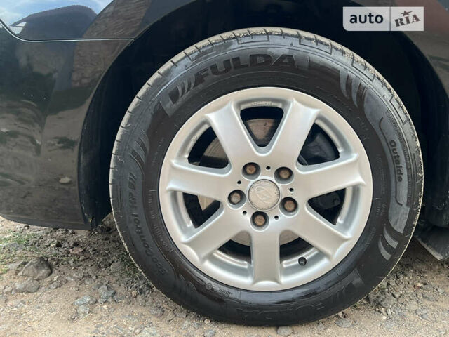 Чорний Хендай i30, об'ємом двигуна 1.59 л та пробігом 247 тис. км за 6250 $, фото 22 на Automoto.ua