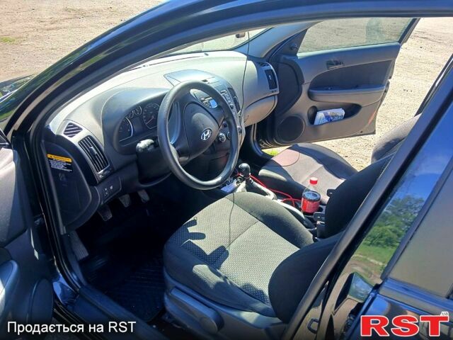 Черный Хендай i30, объемом двигателя 1.4 л и пробегом 208 тыс. км за 5799 $, фото 10 на Automoto.ua