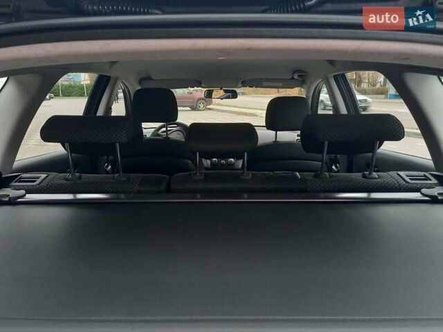 Черный Хендай i30, объемом двигателя 1.4 л и пробегом 216 тыс. км за 6300 $, фото 4 на Automoto.ua