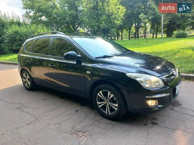 Черный Хендай i30, объемом двигателя 1.58 л и пробегом 203 тыс. км за 5700 $, фото 3 на Automoto.ua