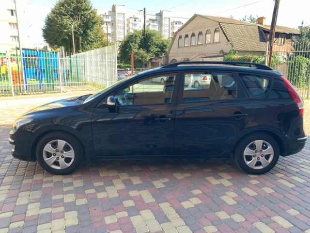 Черный Хендай i30, объемом двигателя 1.6 л и пробегом 189 тыс. км за 6950 $, фото 1 на Automoto.ua