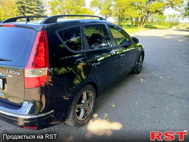 Черный Хендай i30, объемом двигателя 1.4 л и пробегом 208 тыс. км за 5799 $, фото 6 на Automoto.ua