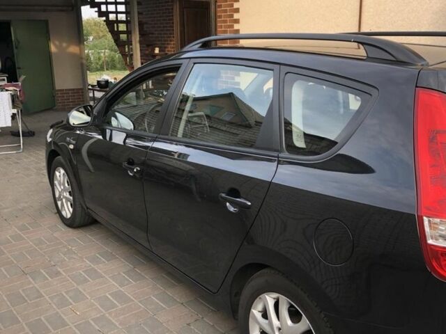 Чорний Хендай i30, об'ємом двигуна 1.4 л та пробігом 217 тис. км за 5500 $, фото 5 на Automoto.ua