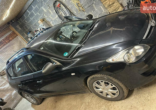 Черный Хендай i30, объемом двигателя 1.58 л и пробегом 243 тыс. км за 5500 $, фото 3 на Automoto.ua