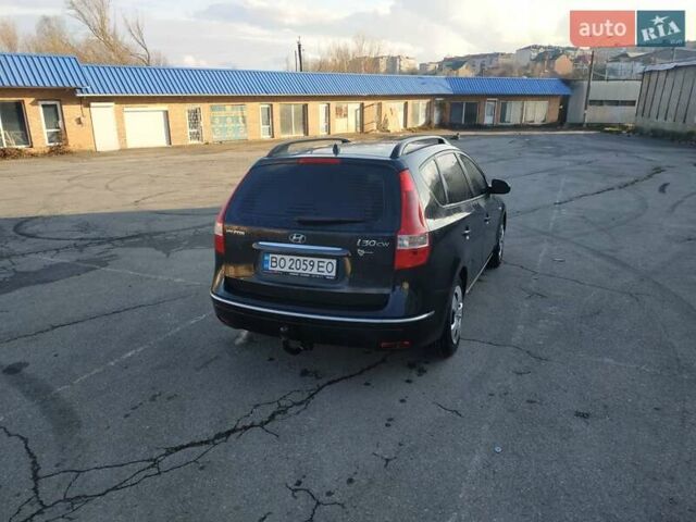 Черный Хендай i30, объемом двигателя 1.4 л и пробегом 158 тыс. км за 5600 $, фото 6 на Automoto.ua