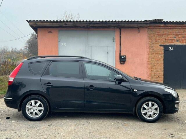 Черный Хендай i30, объемом двигателя 1.6 л и пробегом 265 тыс. км за 6200 $, фото 5 на Automoto.ua
