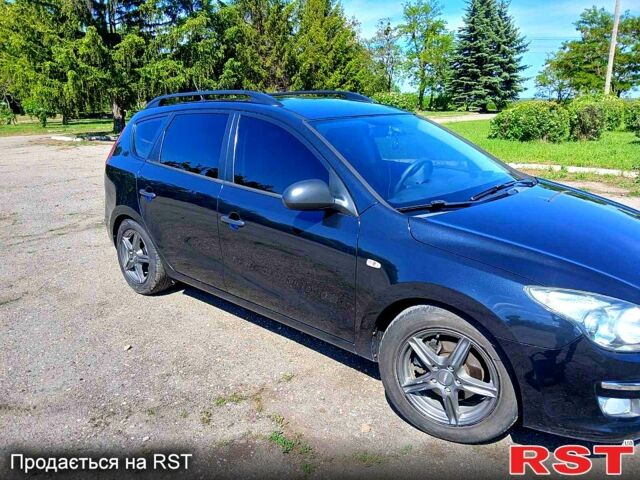 Черный Хендай i30, объемом двигателя 1.4 л и пробегом 208 тыс. км за 5799 $, фото 4 на Automoto.ua