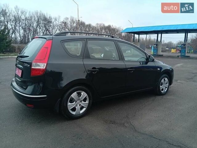 Чорний Хендай i30, об'ємом двигуна 1.6 л та пробігом 221 тис. км за 5900 $, фото 7 на Automoto.ua