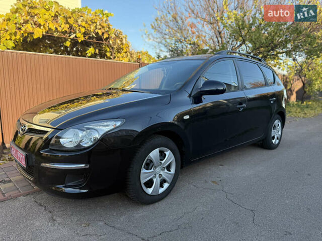 Хендай i30 2009 в Борисполе на Automoto.ua Черный Хендай i30, объемом двигателя 1.6 л и пробегом 229 тыс. км за 7000 $, фото 20 на Automoto.ua