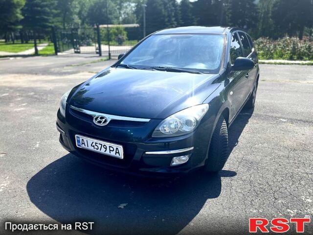 Чорний Хендай i30, об'ємом двигуна 1.4 л та пробігом 200 тис. км за 5600 $, фото 2 на Automoto.ua